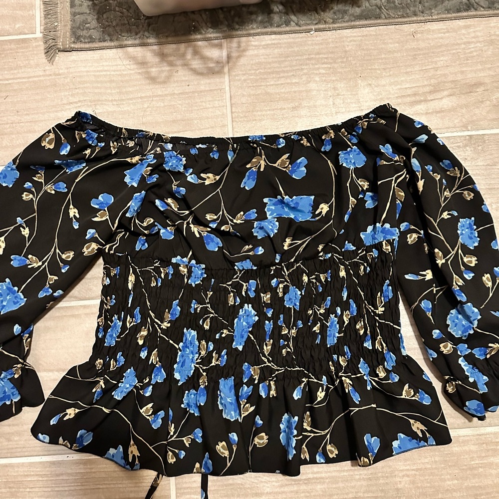 Peplum blouse with blue flowers